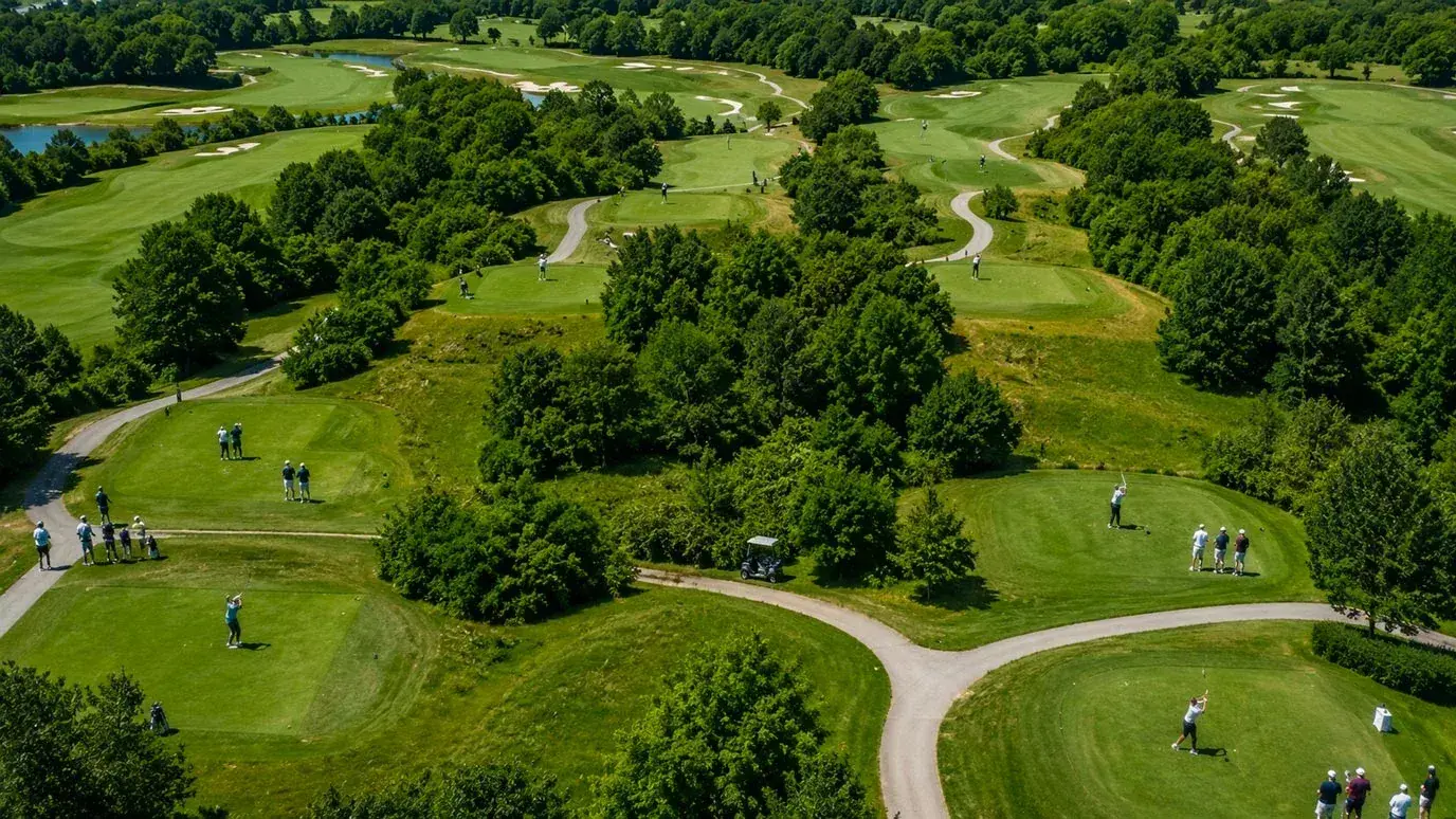 Golfers teeing off simultaneously during LIV Golf shotgun start format