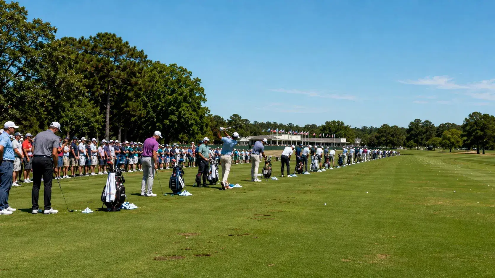 Full field of golfers assembling on the practice range before a PGA Tour event